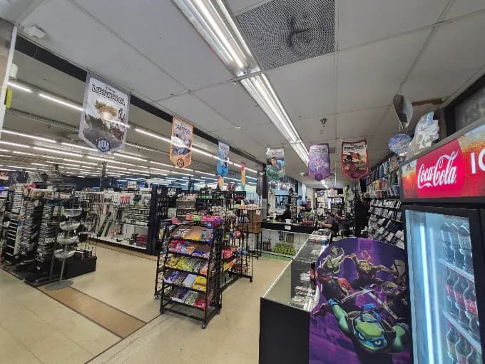 The spacious retail floor and broad game selection inside Gamers N Geeks
